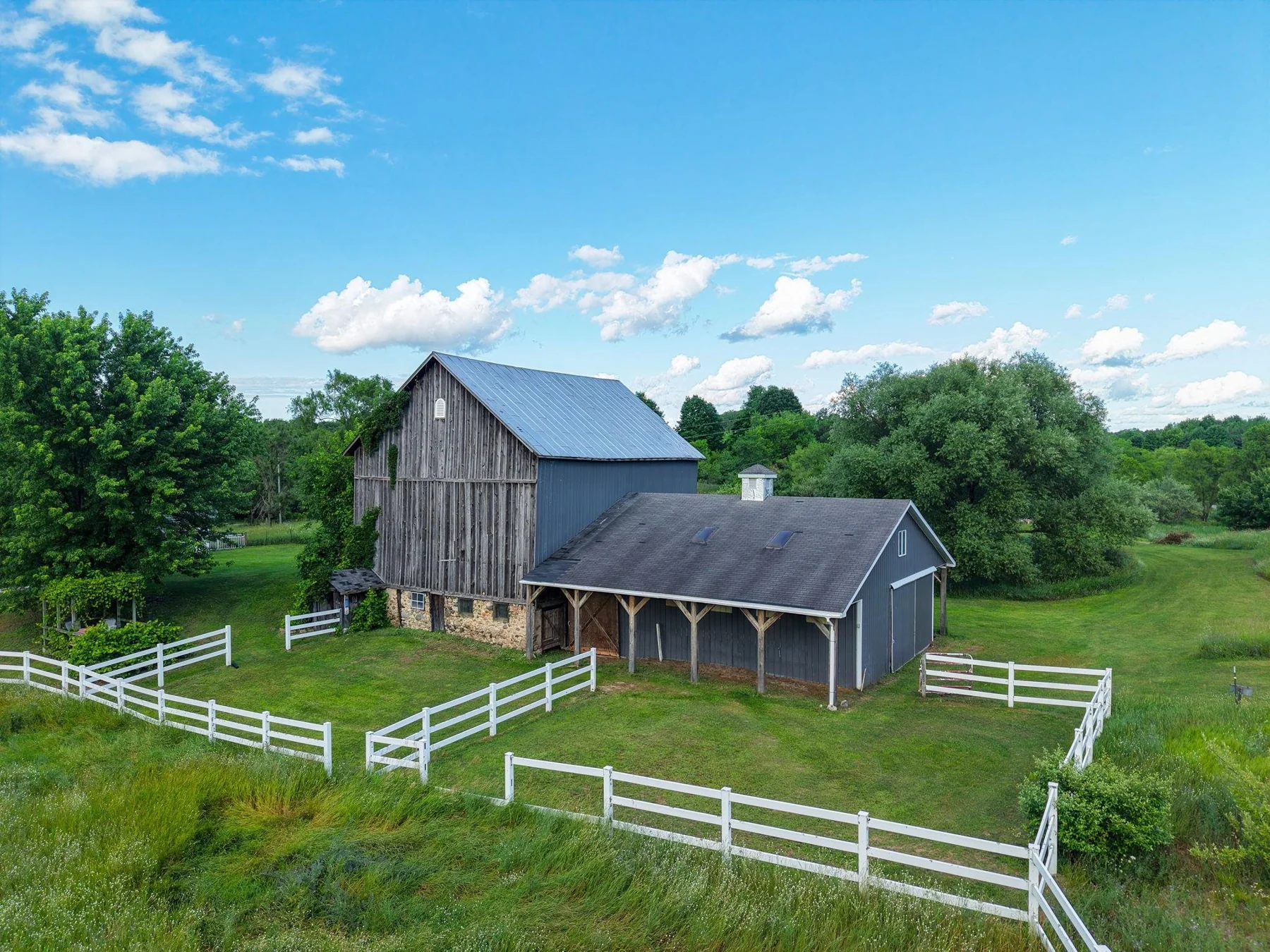 Historic barn and fenced grounds